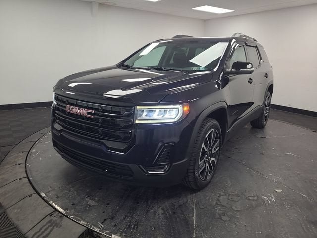 2021 GMC Acadia SLE in Midnight Blue Metallic — front three-quarter view