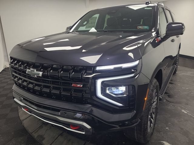2026 Chevrolet Suburban Z71 in Dark Ash Metallic — front three-quarter view