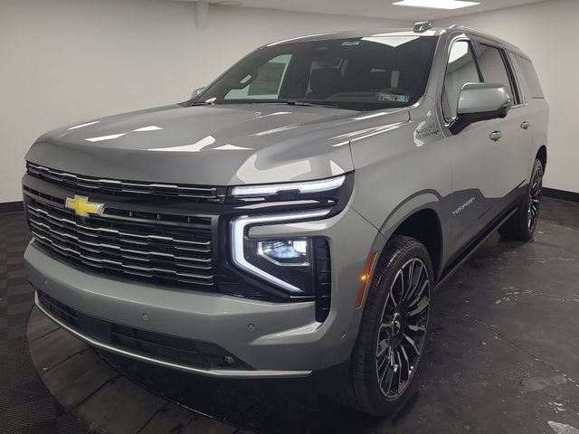 2026 Chevrolet Suburban High Country in Sterling Gray Metallic — front three-quarter view