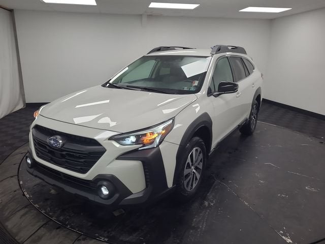 2025 Subaru Outback Premium in Crystal White Pearl — front three-quarter view