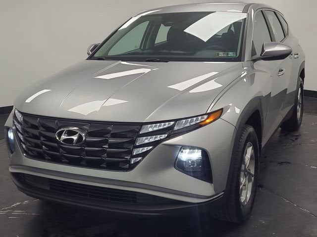 2022 Hyundai Tucson SE in Silver — front three-quarter view